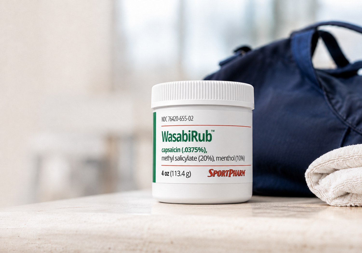 WasabiRub topical pain relief beside a gym bag and towel